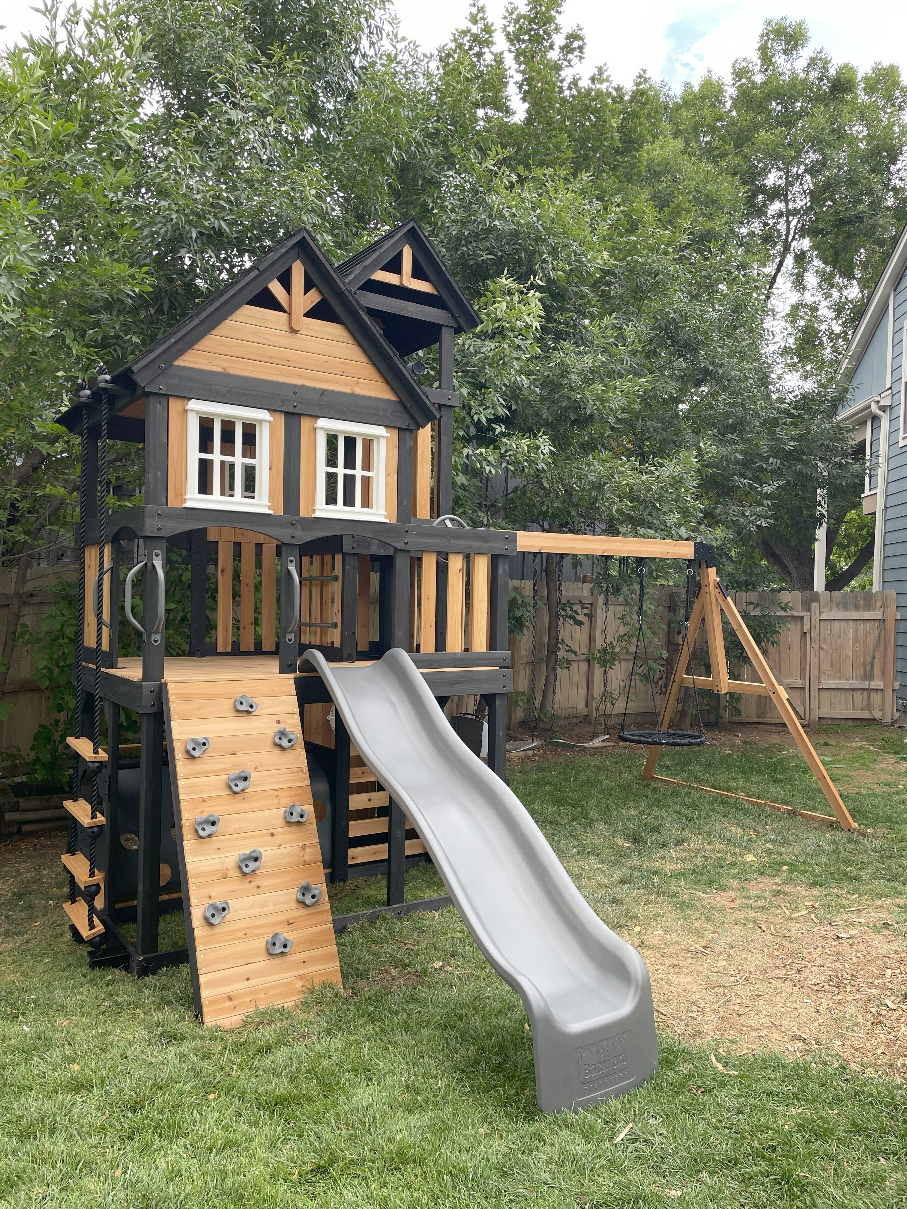 Luxury playset with multiple towers and black accents